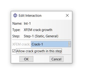 Crack interaction definition in Abaqus XFEM